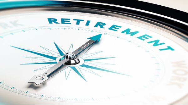 Compass with arrow pointing to the word Retirement