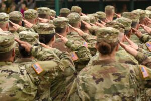 Military members saluting highlighting the Reserve Retirement